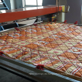 Industrielle Quiltmaschine mit einem Nadel-Nähkopf